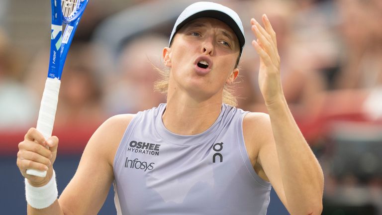 Iga Swiatek, of Poland, reacts during her match against Clara Tauson, of Denmark, during round of 16 action at the National Bank Open women'