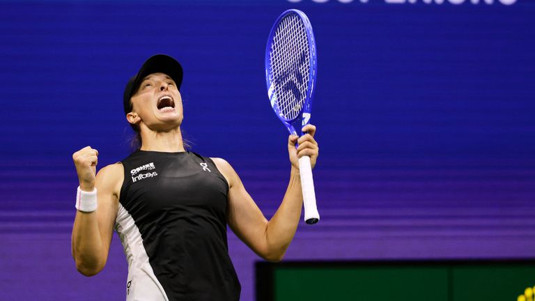 Iga Swiatek, of Poland, reacts after winning match point against Anna Kalinskaya, of Russia, during the third round of the U.S. Open tennis 