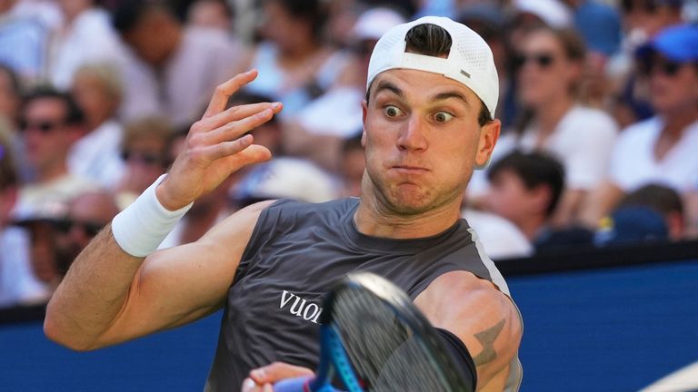 Jack Draper, of Great Britain, returns a shot to Federico Agustin Gomez, of Argentina, during the first round of the US Open tennis champion