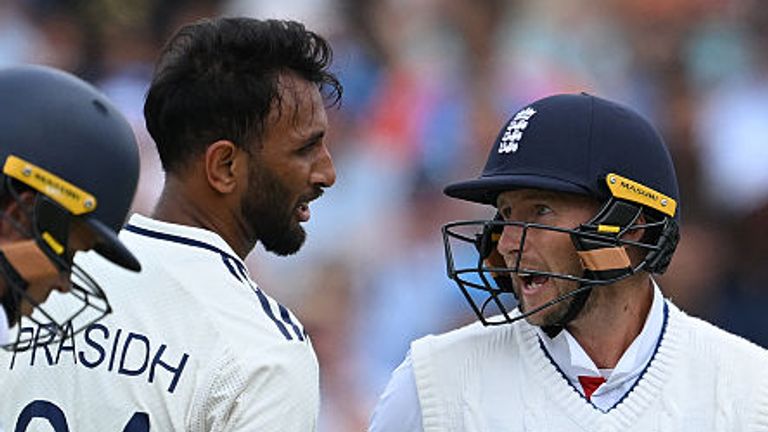 England's Joe Root (R) was involved in a heated exchange with India's bowler Prasidh Krishna on day two of the fifth and final Test
