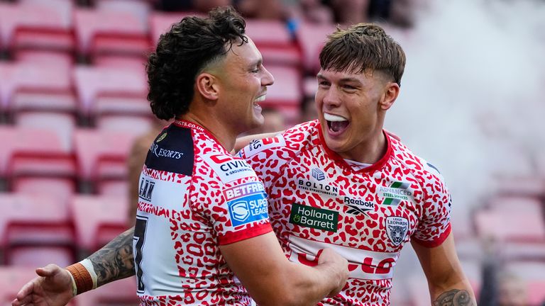 Keanan Brand of Leigh celebrating his try with Lachlan Lam of Leigh