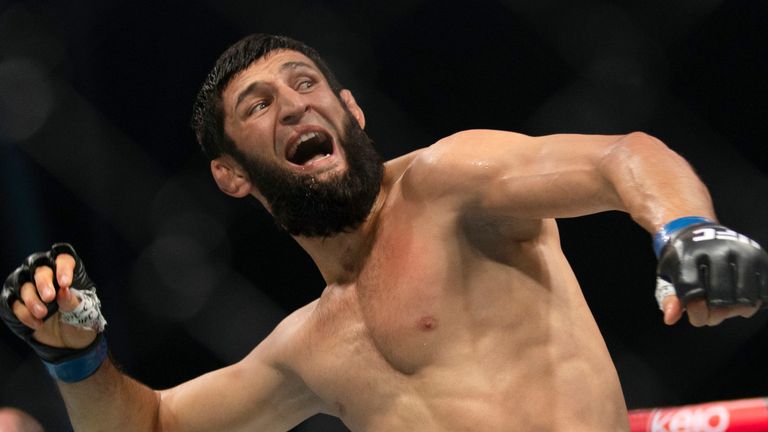 Khamzat Chimaev celebrates his win over Robert Whittaker in a middleweight mixed martial arts bout at UFC Fight Night on Saturday, Oct. 26, 2024, in Abu Dhabi, United Arab Emirates. (AP Photo/Altaf Qadri)
