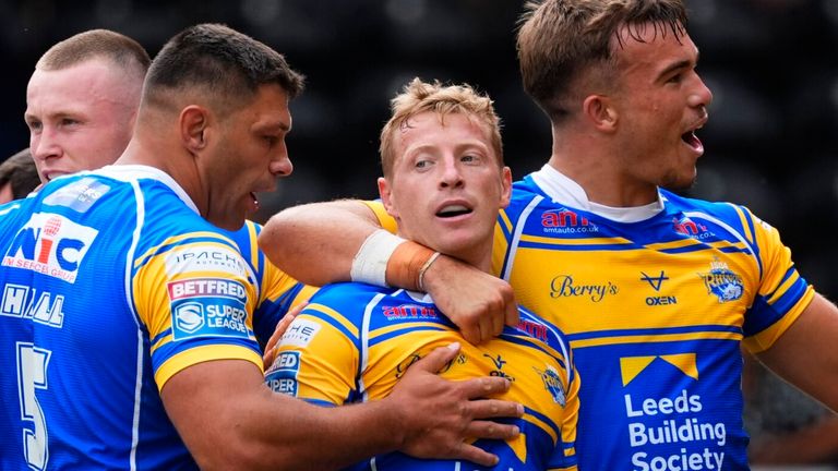 Lachlan Miller and his Leeds Rhinos team-mates celebrate scoring against Castleford Tigers