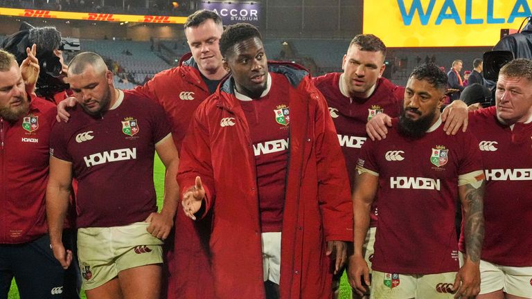 Lions captain Maro Itoje (centre) speaks to his players after the third and final test ends in defeat (AP Photo/Mark Baker)