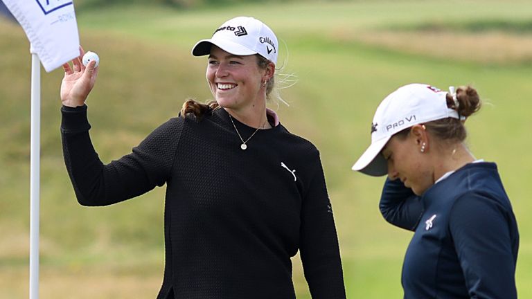 Mimi Rhodes of England celebrates a hole-in-one on the fifth hole during the final round of the AIG Women's Open