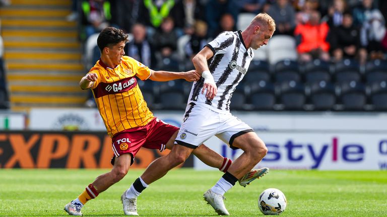 PAISLEY, SCOTLAND - AUGUST 09: Motherwell's Elijah Just and St Mirren's Killian Phillips in action during a William Hill Premiership match between St Mirren and Motherwell at the SMiSA Stadium, on August 09, 2025, in Paisley, Scotland. (Photo by Craig Williamson / SNS Group)
