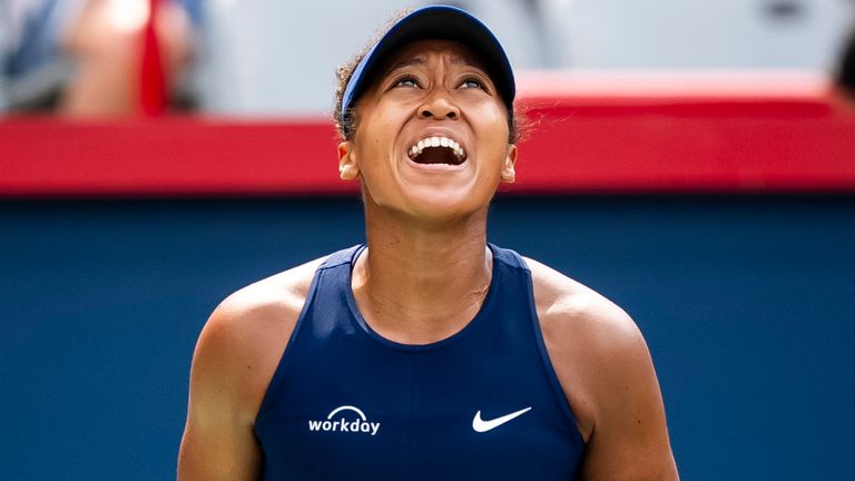 Naomi Osaka celebrates winning a point in Montreal (Christopher Katsarov/The Canadian Press via AP)