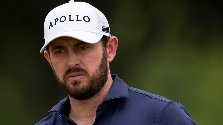 Patrick Cantlay walks off the third green during the final round of the Tour Championship golf tournament, Sunday, Aug. 24, 2025, in Atlanta. (AP Photo/Mike Stewart)