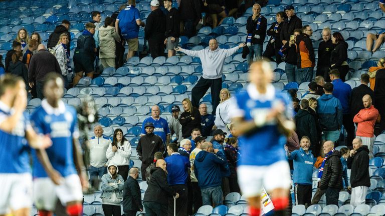 GLASGOW, SCOTLAND - AUGUST 19: A Rangers fan at full time during a UEFA Champions League Play-Offs First Leg match between Rangers and Club Brugge at Ibrox Stadium, on August 19, 2025, in Glasgow, Scotland.  (Photo by Craig Foy / SNS Group)
