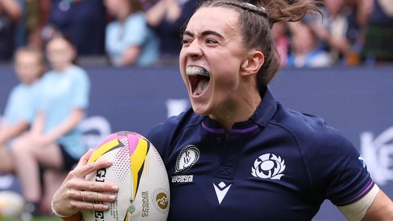 Francesca McGhie celebrates after scoring a try for Scotland against Wales
