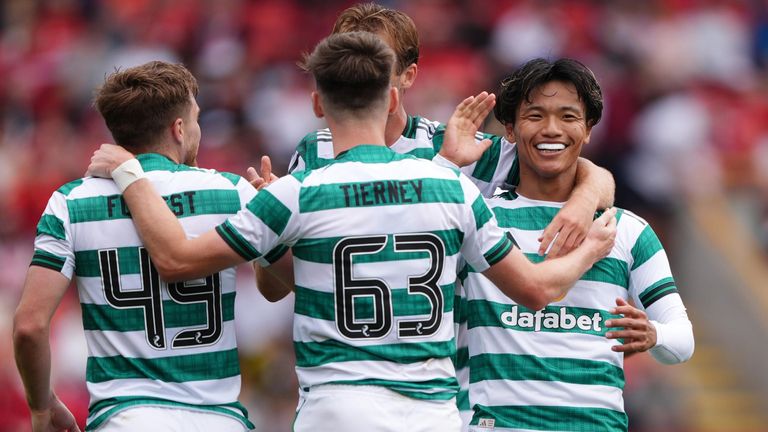 Reo Hatate is congratulated after doubling Celtic's lead at Aberdeen