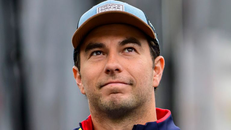Oracle Red Bull Racing driver Sergio Perez, of Mexico, enters the paddock area before the Sprint Race of the Formula 1 U.S. Grand Prix auto race at Circuit of the Americas in Austin, Texas. Saturday, Oct. 19, 2024. (Tyler Tate via AP)