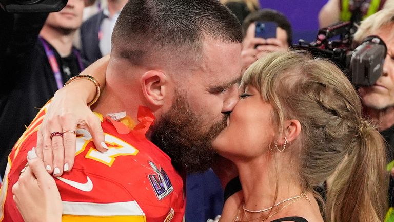FILE - Kansas City Chiefs tight end Travis Kelce (87) and Taylor Swift kiss after the Chiefs defeated the San Francisco 49ers in the NFL Super Bowl 58 football game on Feb. 11, 2024, in Las Vegas. (AP Photo/John Locher, File)
