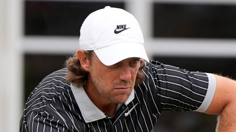Tommy Fleetwood, of England, lines up a putt on the third green during the second round of the Tour Championship golf tournament