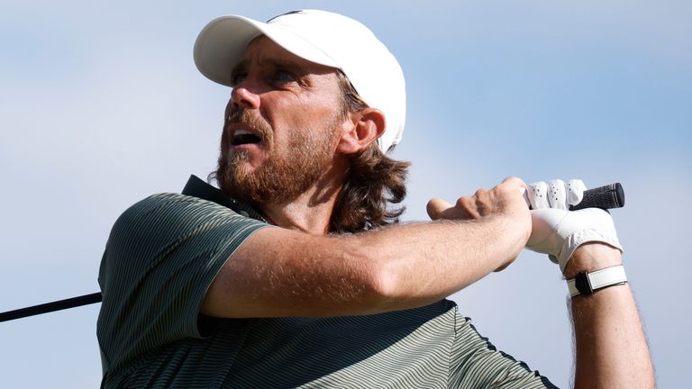 Tommy Fleetwood of England watches his tee shot on No 18 during the third round of the FedEx St. Jude Championship
