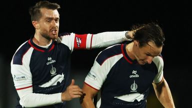 Liam Henderson (right) celebrates with Brad Spencer as Falkirk draw with Hibs