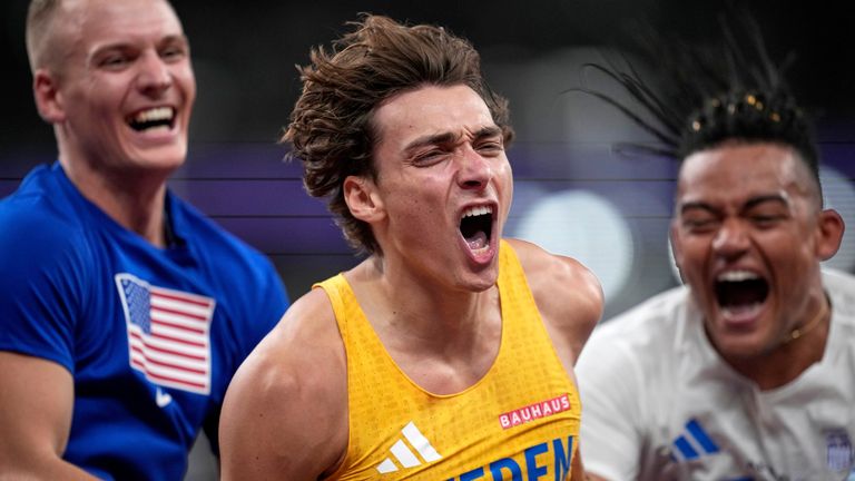 Sweden's Armand Duplantis celebrates with United States' Sam Kendricks and Greece's Emmanouil Karalis after making a clearance to break the world record after winning gold in the men's pole vault final at the World Athletics Championships in Tokyo, Monday, Sept. 15, 2025. (AP Photo/Louise Delmotte)