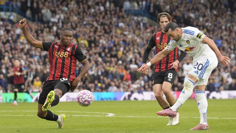 Bafode Diakite  attempts to intercept a shot by Jack Harrison.