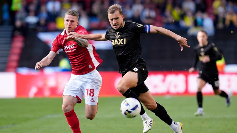 Oxford United climbed out of the Championship relegation zone with victory over the Robins