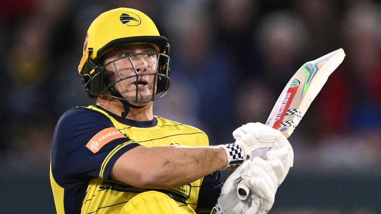Hampshire batsman Hilton Cartwright hits out for six to reach his half century