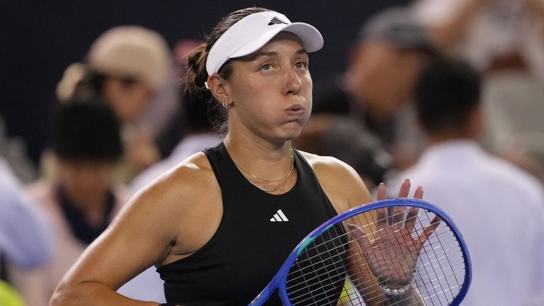 Jessica Pegula reacts after defeating Emma Raducanu in the China Open