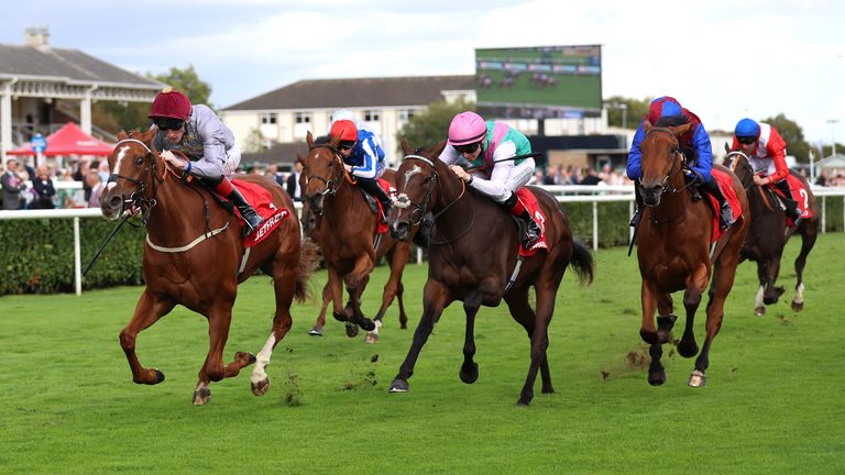 Aylin ridden by David Egan (left) on their way to winning the Betfred May Hill Stakes at Doncaster