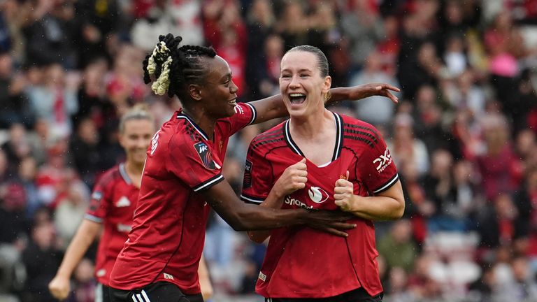 Elisabeth Terland celebrates with team-mate Melvine Malard after scoring for Manchester United against Leicester