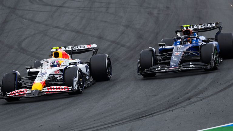 Liam Lawson and Carlos Sainz go side by side at the 2025 Dutch Grand Prix