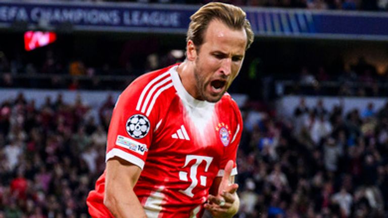 Harry Kane celebrates scoring against Chelsea in the Champions League