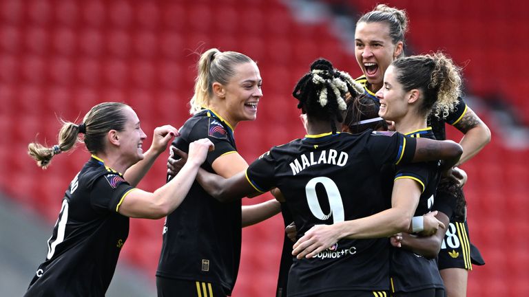 Manchester United's Hinata Miyazawa (hidden) celebrates scoring her side's first goal of the game 