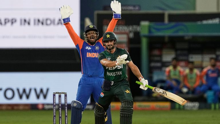India's wicketkeeper Sanju Samson appeals unsuccessfully for the wicket of Pakistan's Sahibzada Farhan, right, during the Asia Cup cricket match between India and Pakistan at Dubai International Cricket Stadium in Dubai, United Arab Emirates, Sunday, Sept. 14, 2025. (AP Photo/Fatima Shbair)