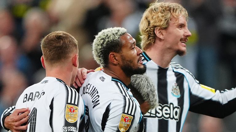 Joelinton (centre) celebrates after scoring his second and Newcastle's third against Bradford City