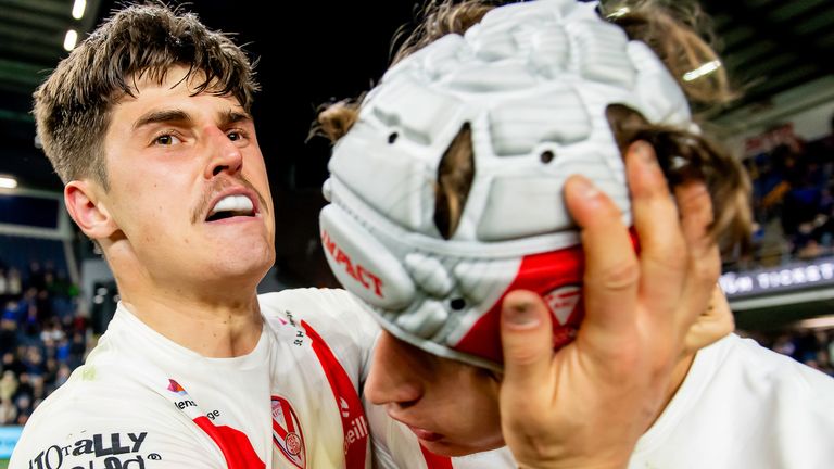 Picture by Allan McKenzie/SWpix.com - 27/09/2025 - Rugby League - Betfred Super League Eliminator - Leeds Rhinos v St Helens - AMT Headingley, Leeds, England - St Helens' Jon Bennison celebrates with Harry Robertson after victory over Leeds.