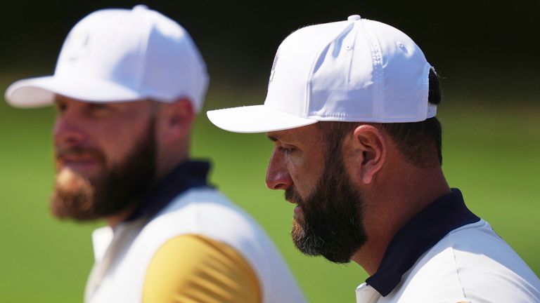 Europe's Jon Rahm and Tyrrell Hatton walks on the 13th hole during a practice round for the Ryder Cup golf tournament 