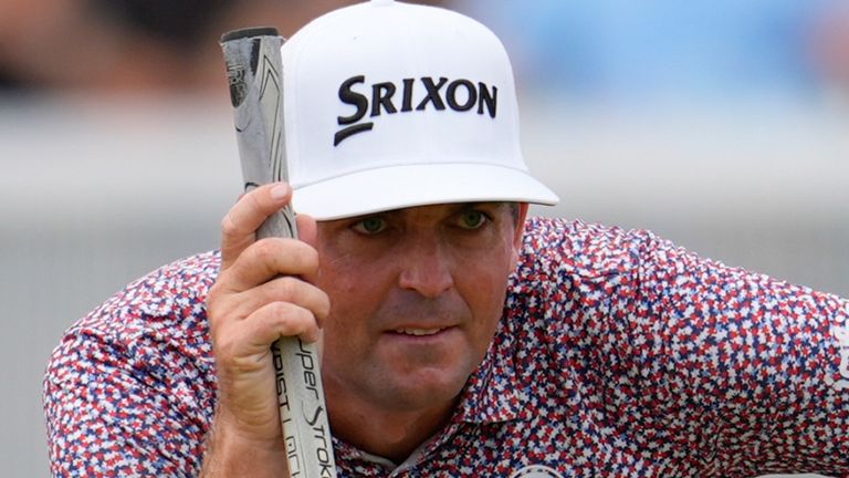 Keegan Bradley lines up a putt on the third green during the final round of the Tour Championship 