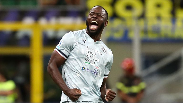 Keinan Davis of Udinese celebrates scoring his team's first goal during the Serie A match against Internazionale at San Siro