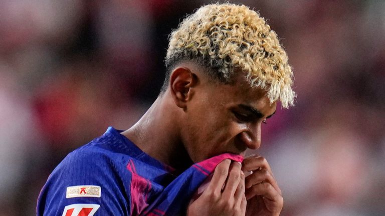 Barcelona's Lamine Yamal reacts during the Spanish La Liga soccer match between Rayo Vallecano and FC Barcelona at the Vallecas stadium in Madrid, Spain, Sunday, Aug. 31, 2025. (AP Photo/Manu Fernandez)