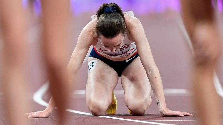 Britain's Laura Muir goes down her knees after failing to qualify for the women's 1,500 metres final at the World Athletics Championships