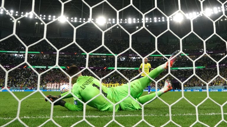 Croatia goalkeeper Dominik Livakovic saves Rodrygo's penalty at the 2018 World Cup in a shootout against Brazil