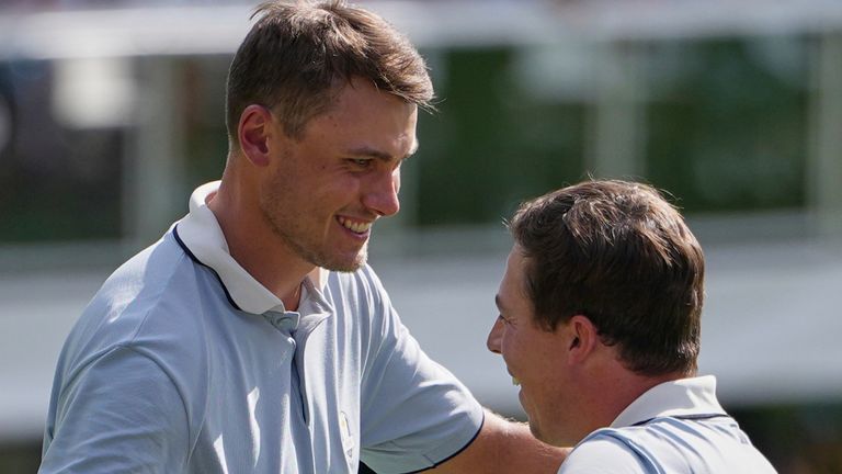 Europe's Matthew Fitzpatrick and Ludvig ..berg celebrate their win on the 15th hole at Bethpage Black golf course during the Ryder Cup golf tournament, Friday, Sept. 26, 2025, in Farmingdale, N.Y. (AP Photo/Matt Slocum)
