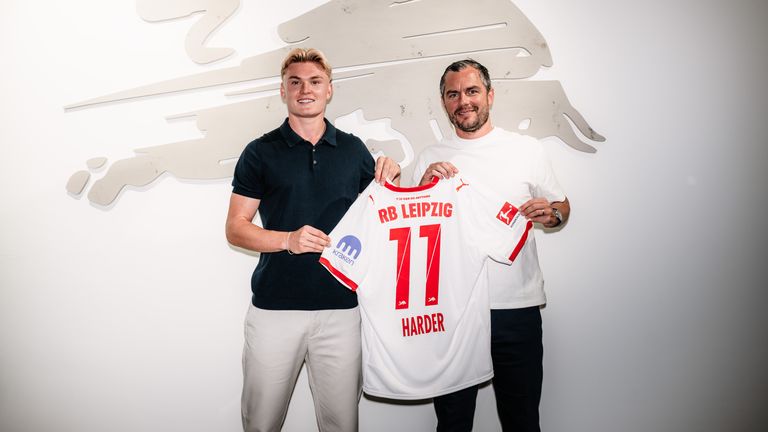 RB Leipzig's managing director for sport Marcel Schafer with new signing Conrad Harder