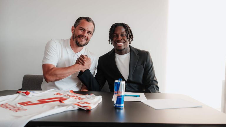 RB Leipzig's managing director for sport Marcel Schafer with new signing Johan Bakayoko