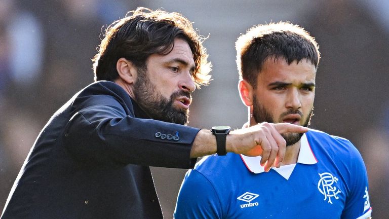 Glasgow, Scotland - August 09: Rangers Nicholas Raskin (PBUH) with the main coach, Russell Martin, where he was replaced during the Premier Hill match between Rangers and Dundy at the Abrax Stadium, on August 09, 2025, in Glasgu, Scotland. (Photo by Rob Casey / SNS)
