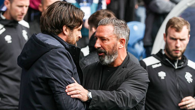 GLASGOW, SCOTLAND - SEPTEMBER 13: Rangers Head Coach Russell Martin and Hearts Head Coach Derek McInnes shake hands during a William Hill Premiership match between Rangers and Heart of Midlothian at Ibrox Stadium, on September 13, 2025, in Glasgow, Scotland. (Photo by Craig Williamson / SNS Group)