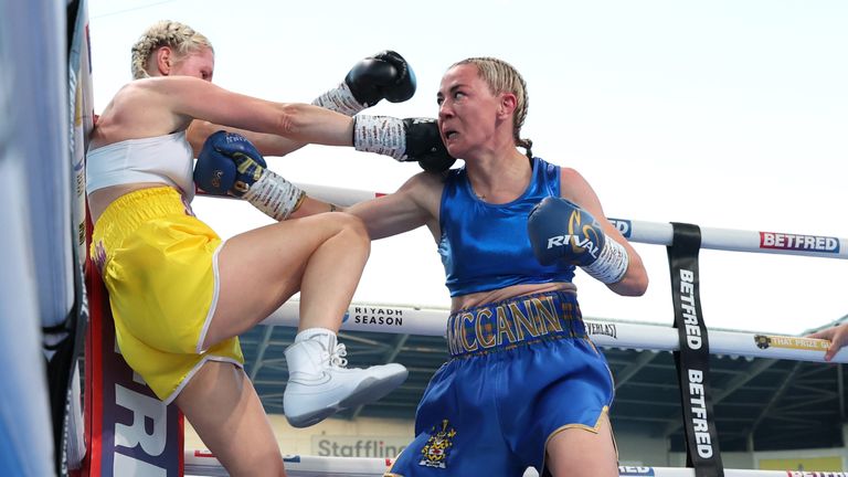 Kate Radomska kicks out at Molly McCann (Photo: Mark Robinson/Matchroom Boxing)