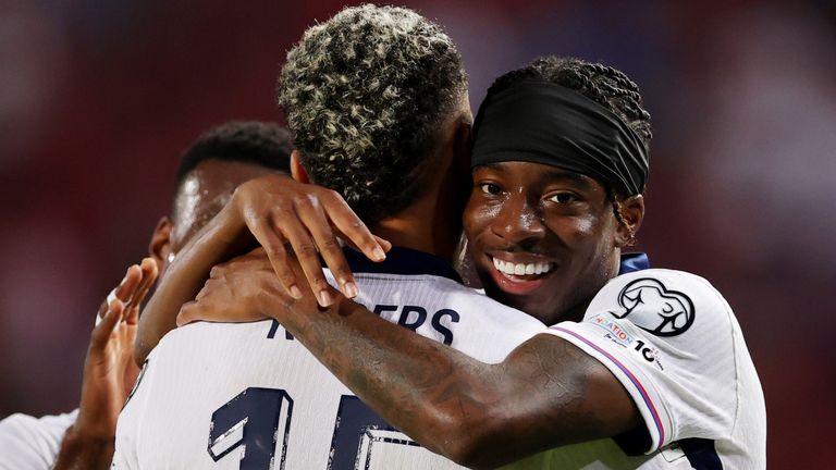 Morgan Rogers and Noni Madueke celebrate during England's 5-0 win in Serbia