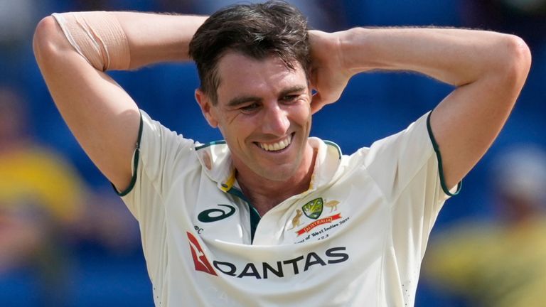 Australia's captain Pat Cummins reacts after delivering to West Indies' Alzarri Joseph during day two of the second cricket Test match at National Cricket Stadium in St. George's, Grenada, Friday, July 4, 2025. (AP Photo/Ricardo Mazalan)