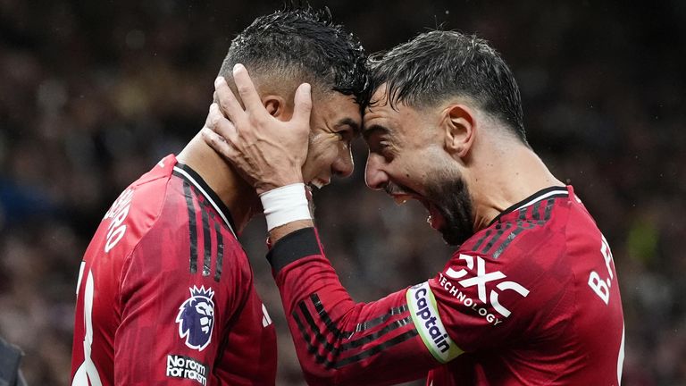 Goalscorers Casemiro and Bruno Fernandes celebrate at Old Trafford