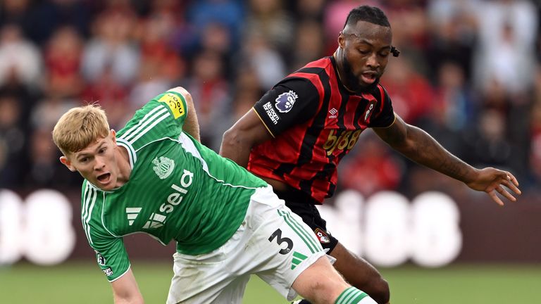 Lewis Hall is challenged by Antoine Semenyo 