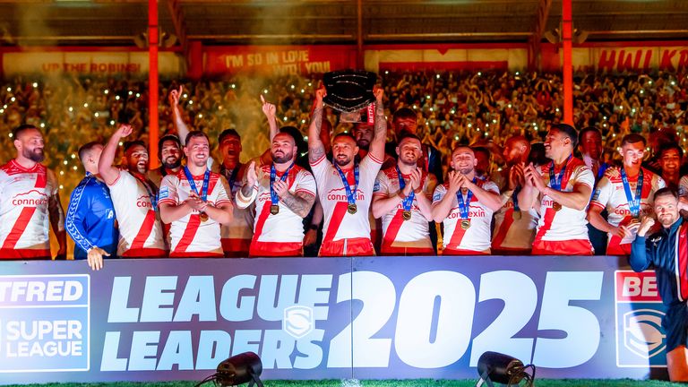 Picture by Allan McKenzie/SWpix.com - 18/09/2025 - Rugby League - Betfred Super League Round 27 - Hull KR v Warrington Wolves - Sewell Group Craven Park, Hull, England - Hull KR captain Elliot Minchella lifts the Betfred Super League Leaders trophy as Hull KR seal the Super League title.